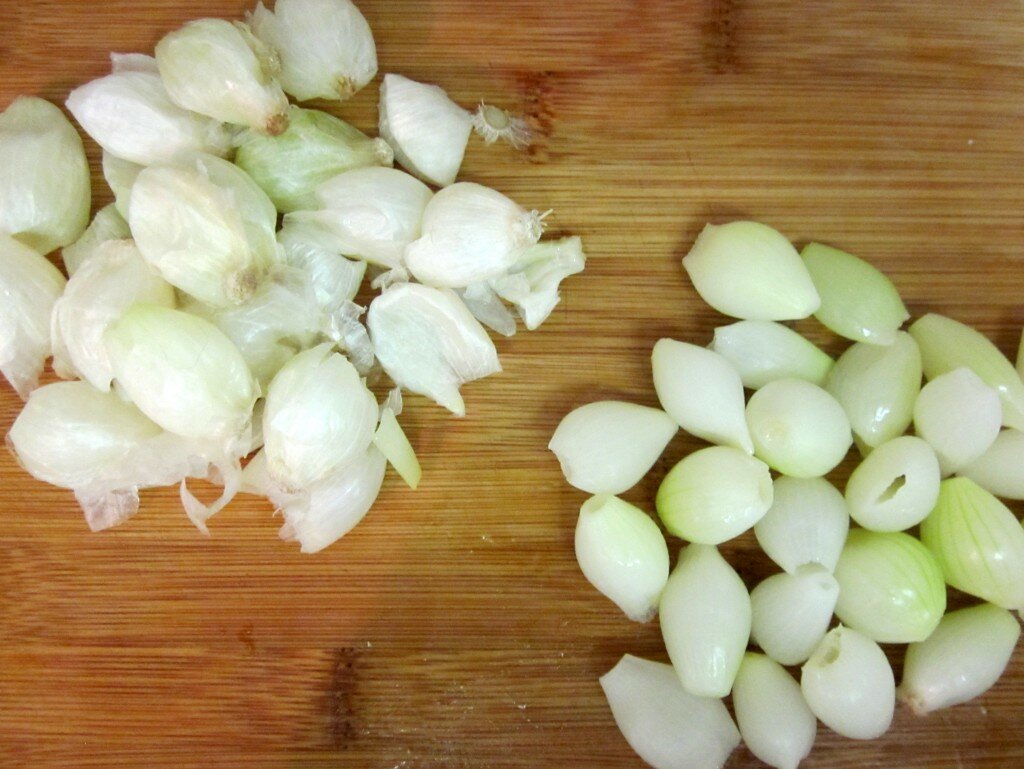 Peeling Pearl Onions Pearl Onions and Pearl Onions Skins on a Cutting Board