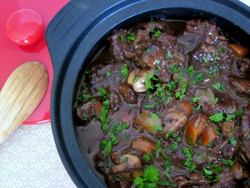 Boeuf Bourguignon Boeuf Bourguignon in a Casserole, Garnished with Parsley